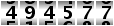 494577