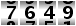 7649