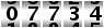 07734