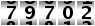 79702