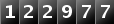 122977