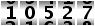 10527