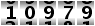 10979