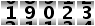 19023