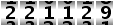 221129