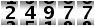 24977