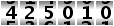 425010