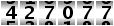 427077