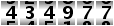 434977