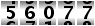 56077