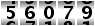 56079
