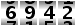 6942