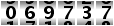 069737