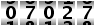 07027