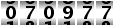 070977