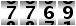 7769